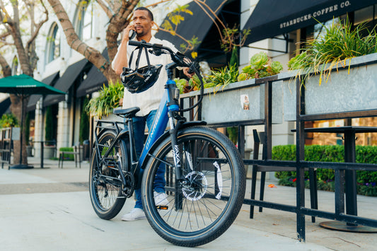 https://cdn.shopify.com/s/files/1/0623/7267/5835/files/Denago_Commute2_Step_Thru_Ebike_Commute_Shoot_2_4d7e1e5a-0e3e-4278-b9d4-381926429e1b.jpg?v=1734197800