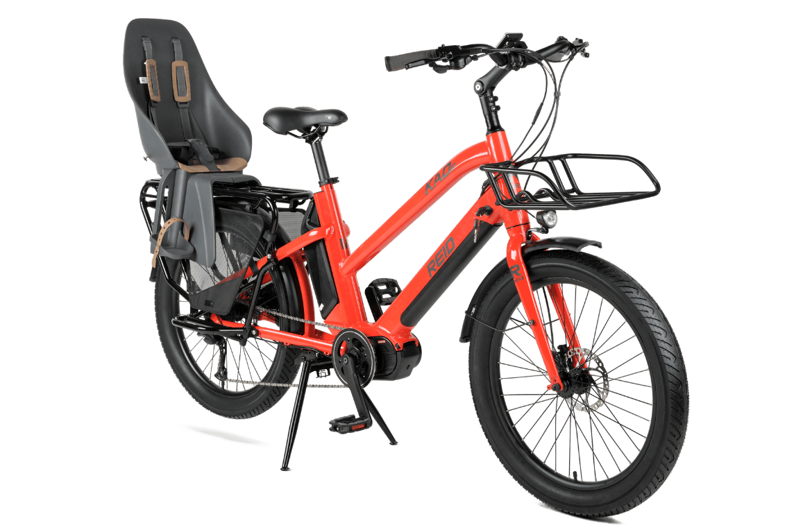 https://cdn.shopify.com/s/files/1/0885/3756/3504/files/kade-cargo-ebike-orange-reid-bikes-311892.png?v=1730603588